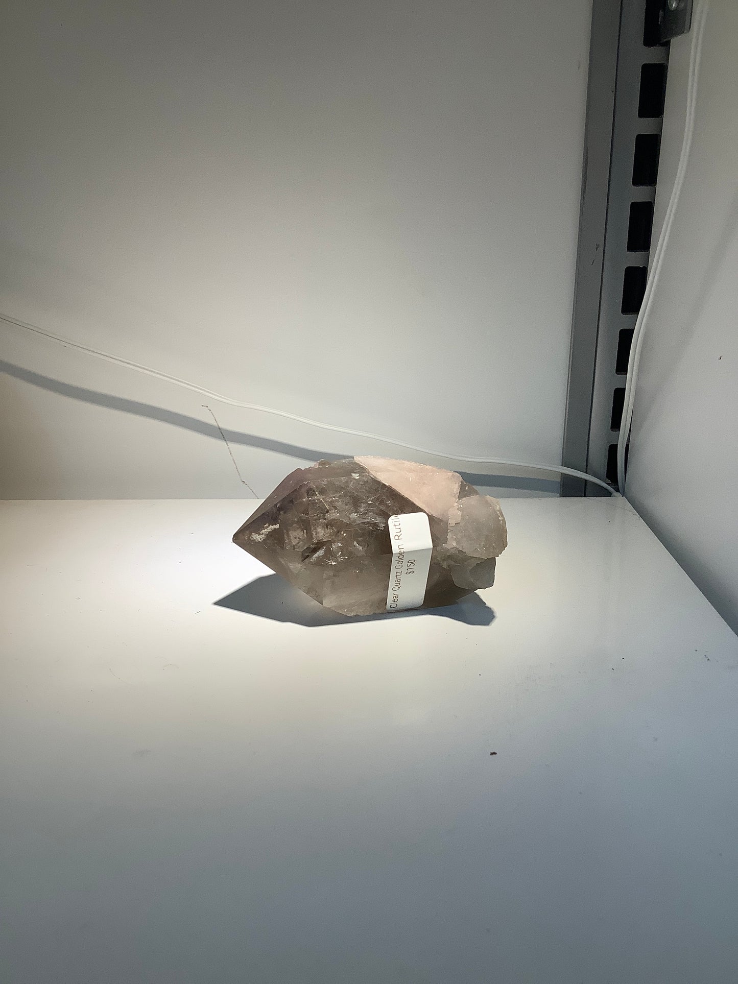 Specimen - Clear Quartz Point with Golden Rutile Inclusion